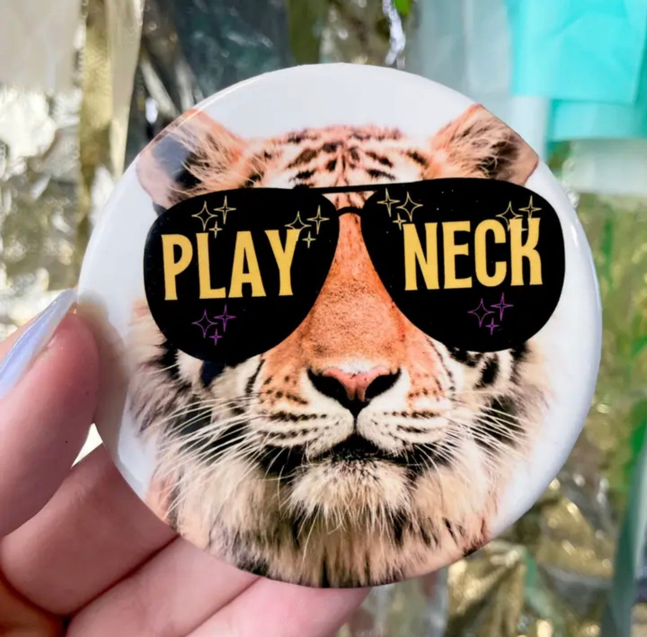 Play Neck Game day button